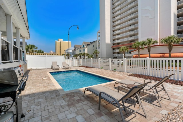 1616 S Ocean Blvd, North Myrtle Beach, SC 29582 - view of pool featuring a patio and a fenced backyard