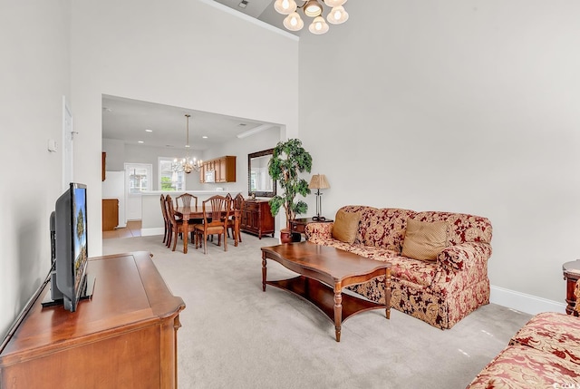 101 Culpepper Way Unit 1006, Myrtle Beach, SC 29579 - living area with a chandelier, light carpet, baseboards, and a high ceiling