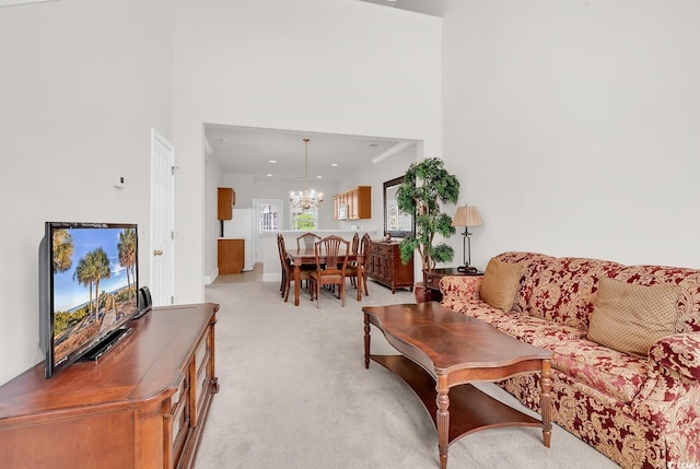 101 Culpepper Way Unit 1006, Myrtle Beach, SC 29579 - living room with a chandelier, light carpet, and a towering ceiling