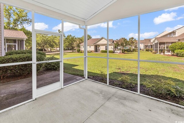 101 Culpepper Way Unit 1006, Myrtle Beach, SC 29579 - unfurnished sunroom with lofted ceiling and a residential view