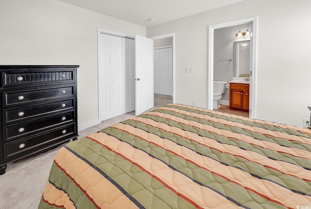 101 Culpepper Way Unit 1006, Myrtle Beach, SC 29579 - bedroom featuring a closet, ensuite bathroom, and light colored carpet