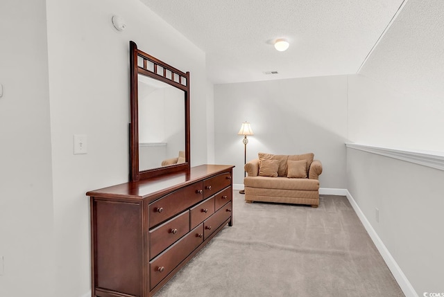 101 Culpepper Way Unit 1006, Myrtle Beach, SC 29579 - sitting room featuring light carpet, a textured ceiling, and baseboards