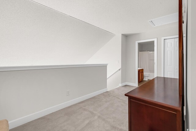 101 Culpepper Way Unit 1006, Myrtle Beach, SC 29579 - unfurnished office with attic access, light colored carpet, a textured ceiling, and baseboards