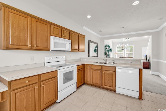 101 Culpepper Way Unit 1006, Myrtle Beach, SC 29579 - kitchen featuring white appliances, a peninsula, a sink, a chandelier, and crown molding