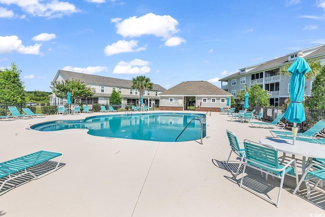 101 Culpepper Way Unit 1006, Myrtle Beach, SC 29579 - community pool featuring a patio