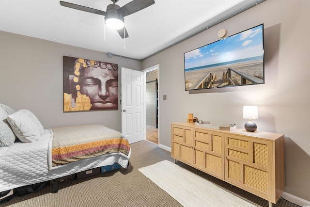 210 Double Eagle Dr Unit B-2, Surfside Beach, SC 29575 - carpeted bedroom with baseboards and a ceiling fan