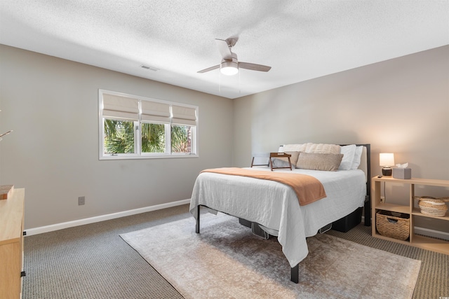 210 Double Eagle Dr Unit B-2, Surfside Beach, SC 29575 - carpeted bedroom with a ceiling fan, baseboards, and a textured ceiling