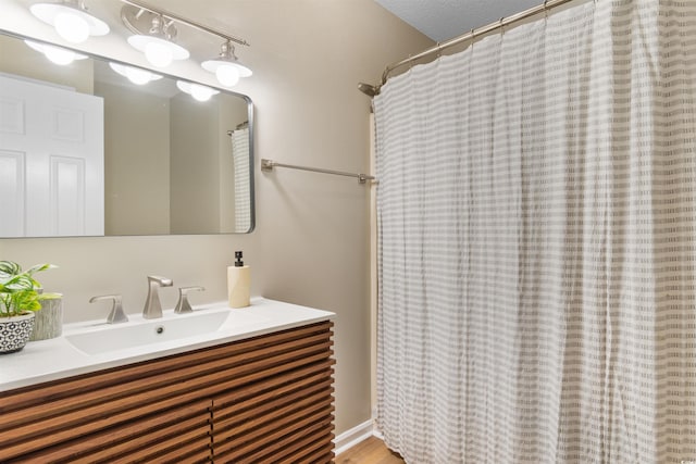 210 Double Eagle Dr Unit B-2, Surfside Beach, SC 29575 - bathroom with vanity and a shower with curtain