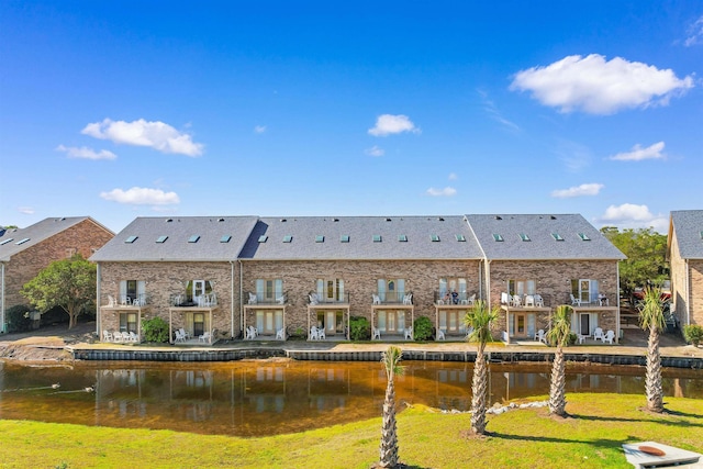 210 Double Eagle Dr Unit B-2, Surfside Beach, SC 29575 - back of house with a water view and brick siding