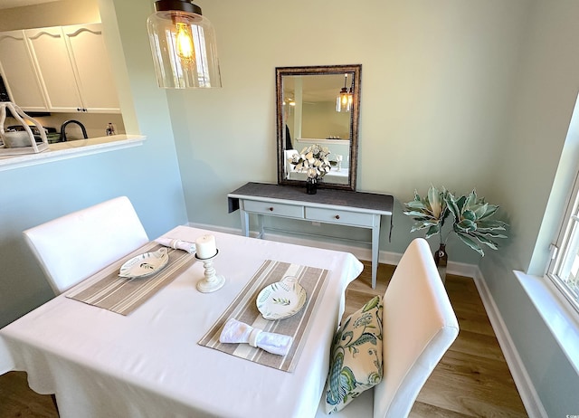 107 Pawleys Place Dr Unit 107, Pawleys Island, SC 29585 - dining room featuring wood finished floors and baseboards