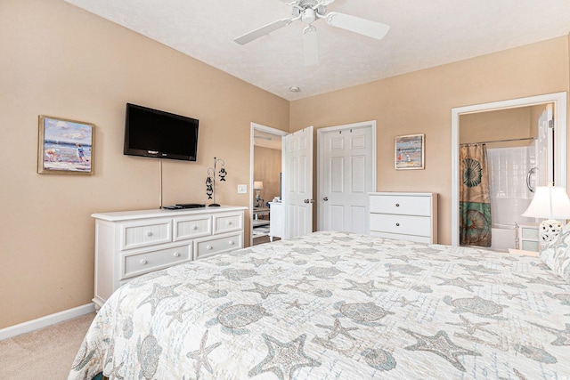601 Hillside Dr N Unit 2135, North Myrtle Beach, SC 29582 - carpeted bedroom featuring baseboards, a ceiling fan, and connected bathroom