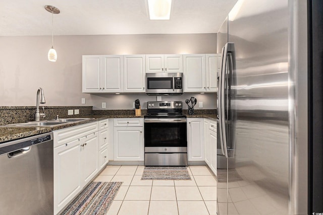 601 Hillside Dr N Unit 2135, North Myrtle Beach, SC 29582 - kitchen with stainless steel appliances, a sink, and white cabinets