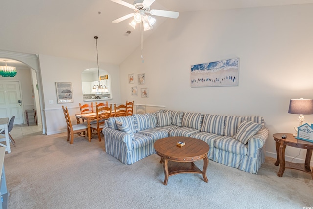 6203 Catalina Dr Unit 1333, North Myrtle Beach, SC 29582 - living area with arched walkways, light carpet, a ceiling fan, high vaulted ceiling, and baseboards