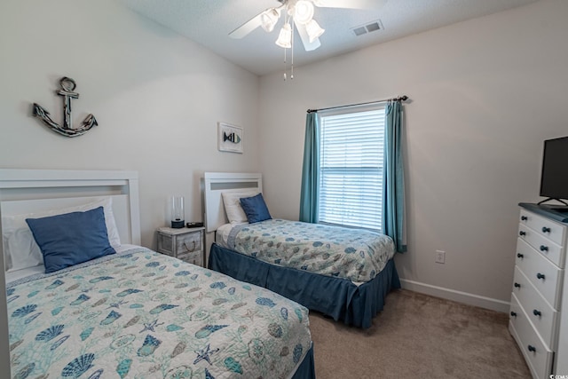 6203 Catalina Dr Unit 1333, North Myrtle Beach, SC 29582 - carpeted bedroom featuring baseboards and a ceiling fan