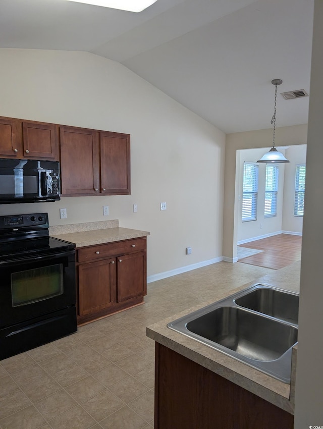 281 Palmetto Glen Dr, Myrtle Beach, SC 29588 - kitchen with black appliances, a sink, lofted ceiling, decorative light fixtures, and baseboards