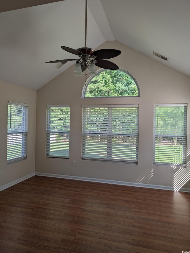281 Palmetto Glen Dr, Myrtle Beach, SC 29588 - empty room featuring lofted ceiling, a ceiling fan, dark wood-type flooring, and baseboards