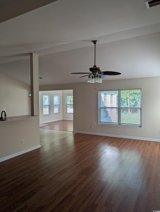 281 Palmetto Glen Dr, Myrtle Beach, SC 29588 - unfurnished room with dark wood-style floors, baseboards, a ceiling fan, and vaulted ceiling