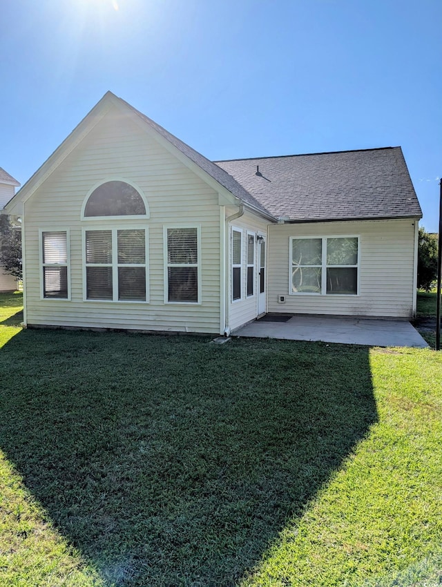 281 Palmetto Glen Dr, Myrtle Beach, SC 29588 - back of property featuring a patio area, a yard, and roof with shingles