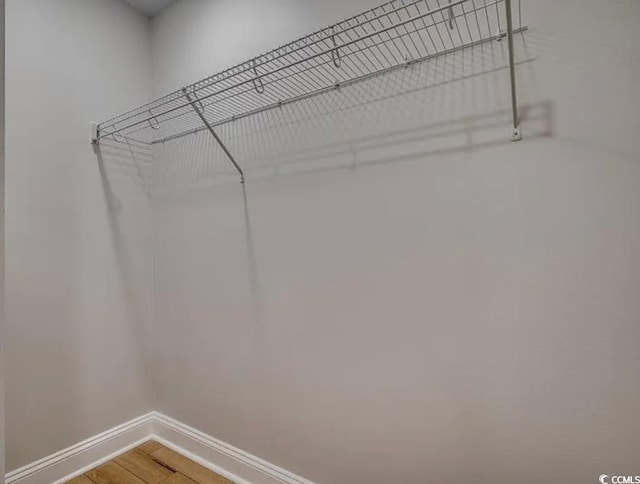2599 Woodcreek Ln, Conway, SC 29527 - spacious closet featuring wood finished floors