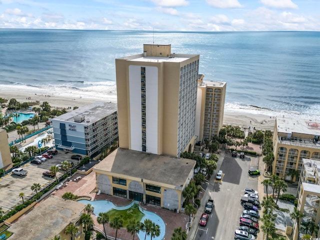 1207 S Ocean Blvd Unit 20109, Myrtle Beach, SC 29577 - drone / aerial view of waterfront with a beach and a pool