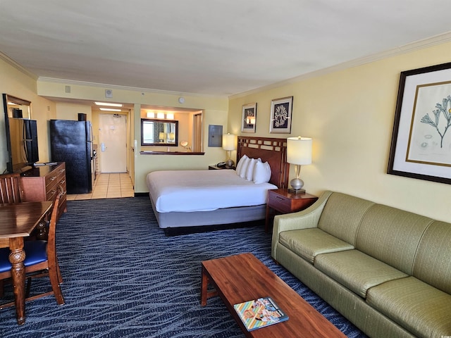 5300 N Ocean Blvd Unit 306, Myrtle Beach, SC 29577 - bedroom featuring freestanding refrigerator, ornamental molding, and carpet