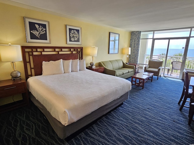 5300 N Ocean Blvd Unit 306, Myrtle Beach, SC 29577 - bedroom featuring crown molding, access to outside, dark colored carpet, and expansive windows
