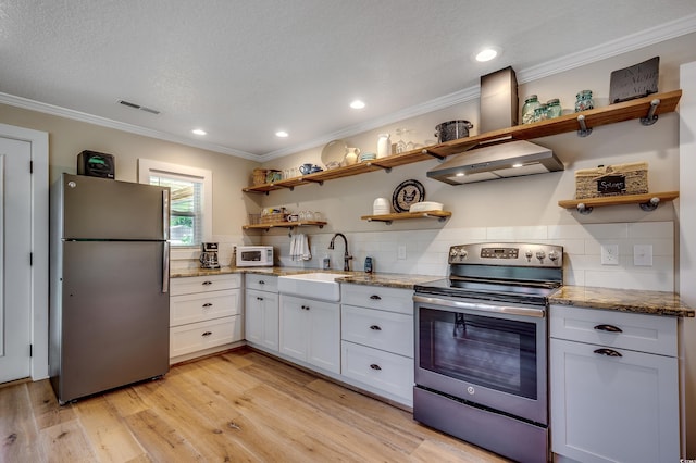 112 Blue Gull Dr, Conway, SC 29526 - kitchen with stainless steel appliances, open shelves, extractor fan, a sink, and ornamental molding