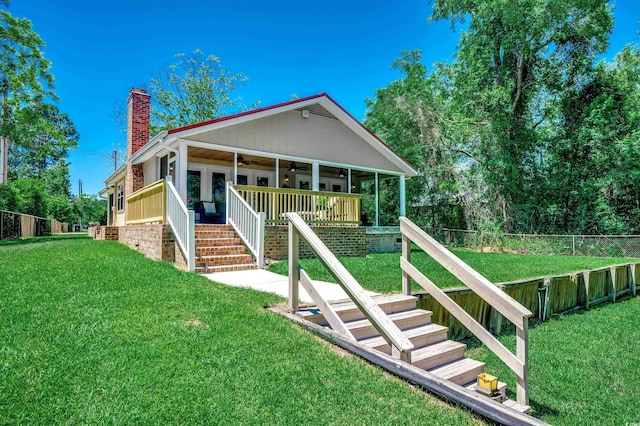 112 Blue Gull Dr, Conway, SC 29526 - view of front of house with stairs, ceiling fan, a chimney, and covered porch