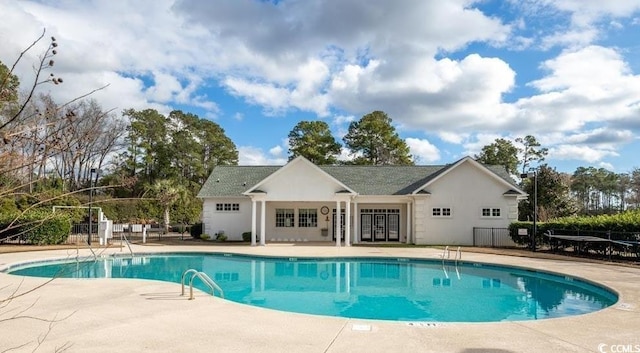 7005 Wellesley Ct, Murrells Inlet, SC 29576 - view of swimming pool with french doors and a patio