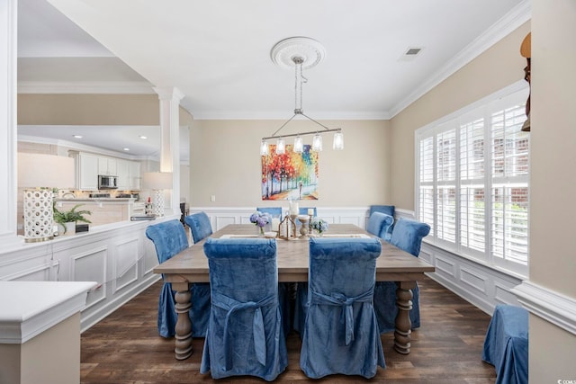 7005 Wellesley Ct, Murrells Inlet, SC 29576 - dining room with dark wood finished floors, ornamental molding, a decorative wall, and a wainscoted wall