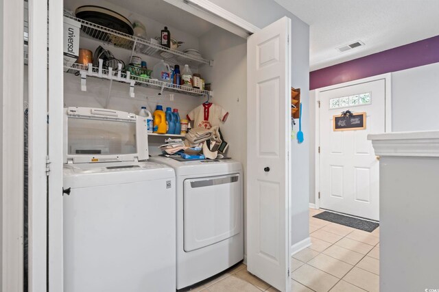 1102 Stanton Pl Unit 1102, Myrtle Beach, SC 29579 - laundry area featuring light tile patterned flooring and separate washer and dryer