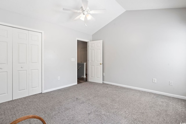 1102 Stanton Pl Unit 1102, Myrtle Beach, SC 29579 - unfurnished bedroom with carpet flooring, lofted ceiling, a closet, and baseboards