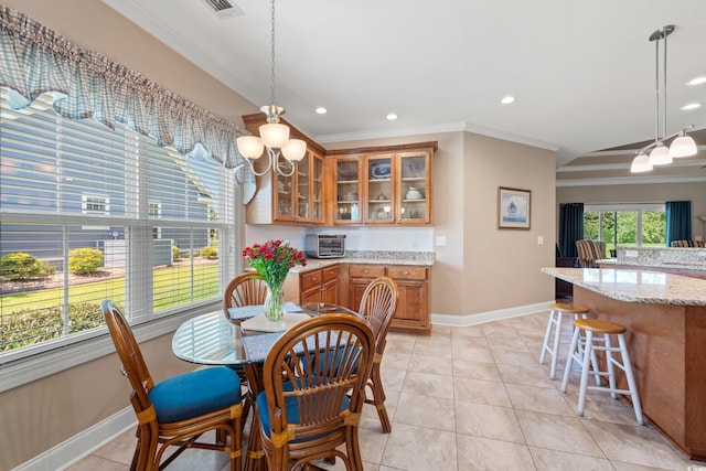 1025 Limpkin Dr, Conway, SC 29526 - dining space featuring ornamental molding, a chandelier, recessed lighting, and light tile patterned flooring