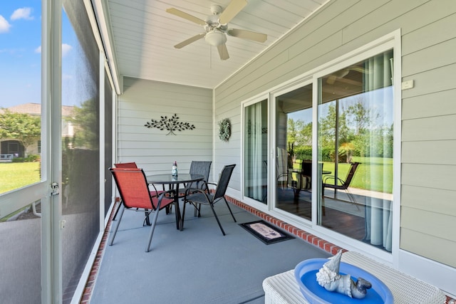 1025 Limpkin Dr, Conway, SC 29526 - sunroom with plenty of natural light, a ceiling fan, and outdoor dining area
