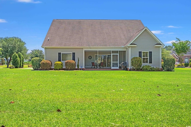 1025 Limpkin Dr, Conway, SC 29526 - rear view of house with a yard, a sunroom, and roof with shingles