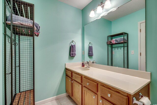 251 Egret Run Ln Unit 1122, Pawleys Island, SC 29585 - bathroom featuring vanity, tile patterned flooring, and baseboards