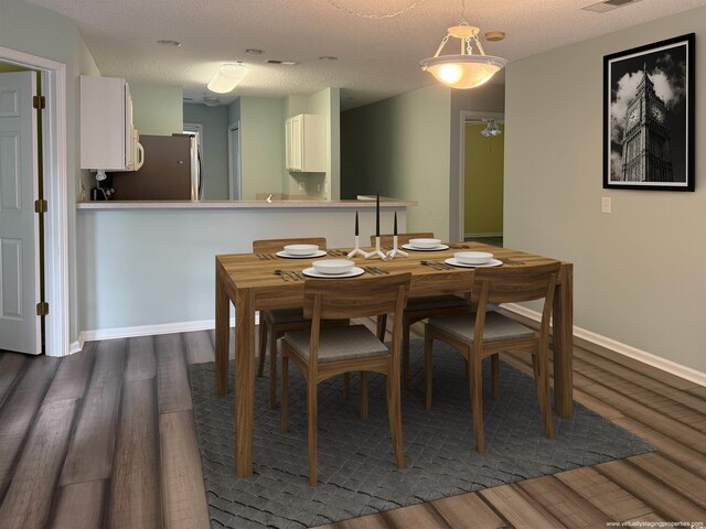 251 Egret Run Ln Unit 1122, Pawleys Island, SC 29585 - dining area featuring dark wood finished floors, baseboards, and a ceiling fan