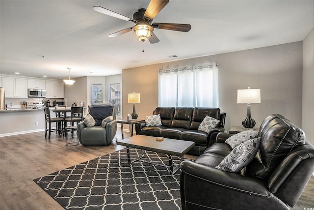4853 Meadowsweet Dr Unit 1805, Myrtle Beach, SC 29579 - living room featuring a ceiling fan and wood finished floors