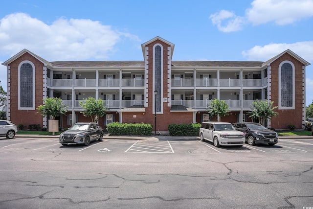 4853 Meadowsweet Dr Unit 1805, Myrtle Beach, SC 29579 - view of building exterior with uncovered parking