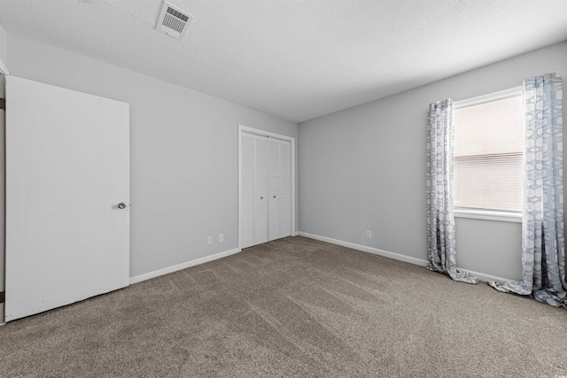 755 Burcale Rd Unit E-3, Myrtle Beach, SC 29579 - unfurnished bedroom featuring carpet floors, a closet, and baseboards