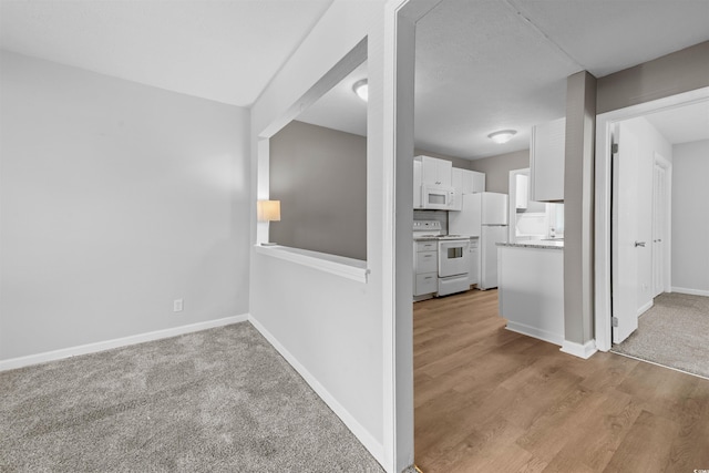 755 Burcale Rd Unit E-3, Myrtle Beach, SC 29579 - hallway with baseboards and wood finished floors