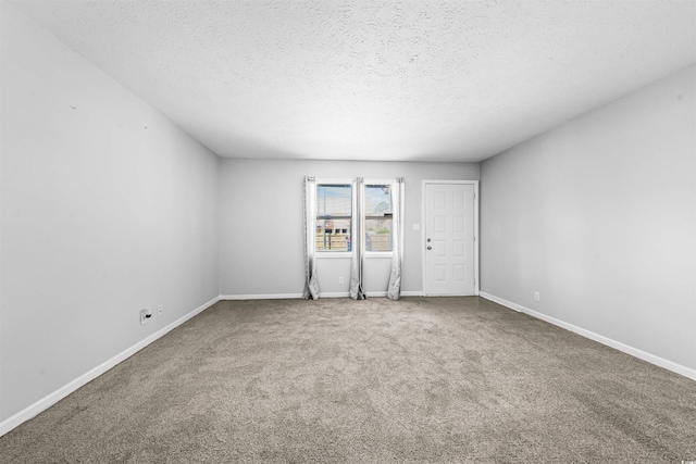 755 Burcale Rd Unit E-3, Myrtle Beach, SC 29579 - carpeted spare room featuring a textured ceiling and baseboards
