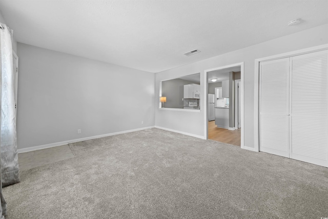 755 Burcale Rd Unit E-3, Myrtle Beach, SC 29579 - unfurnished living room featuring carpet flooring and baseboards