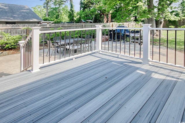 900 47th Ave N, Myrtle Beach, SC 29577 - wooden deck with outdoor dining space and a fenced backyard