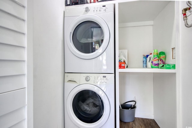 900 47th Ave N, Myrtle Beach, SC 29577 - washroom featuring stacked washer / drying machine and wood finished floors