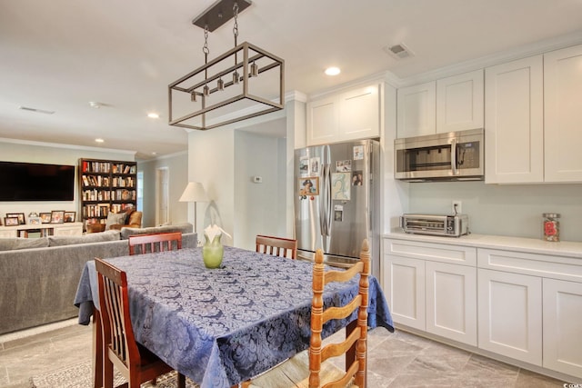 900 47th Ave N, Myrtle Beach, SC 29577 - dining room with crown molding and recessed lighting