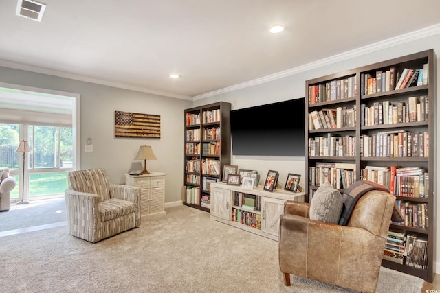 900 47th Ave N, Myrtle Beach, SC 29577 - living area with carpet floors, bookshelves, ornamental molding, recessed lighting, and baseboards