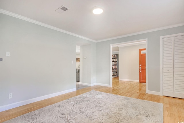 900 47th Ave N, Myrtle Beach, SC 29577 - unfurnished room featuring light wood-type flooring, crown molding, and baseboards