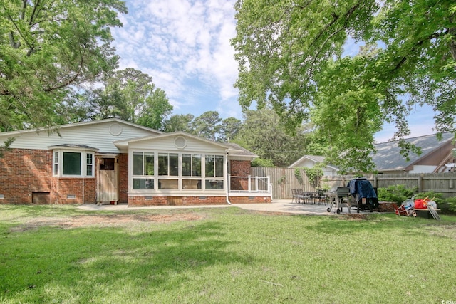 900 47th Ave N, Myrtle Beach, SC 29577 - rear view of property featuring crawl space, brick siding, and a patio area
