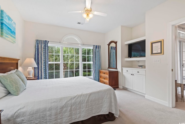 5750 Oyster Catcher Dr Unit 822, North Myrtle Beach, SC 29582 - bedroom with light carpet and ceiling fan